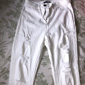 Fashion Nova white ripped jeans. Size 9.